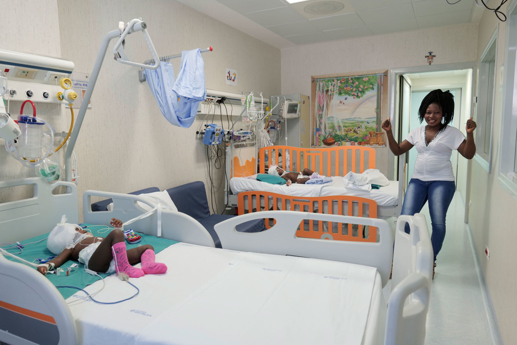 Twin girls, joined at the skull, successfully separated in 18-hour operation in Vatican hospital